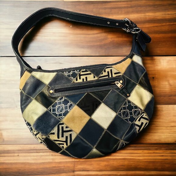 Look hip while out and about with this cool, boho Tignanello shoulder bag! - Picture 1 of 5